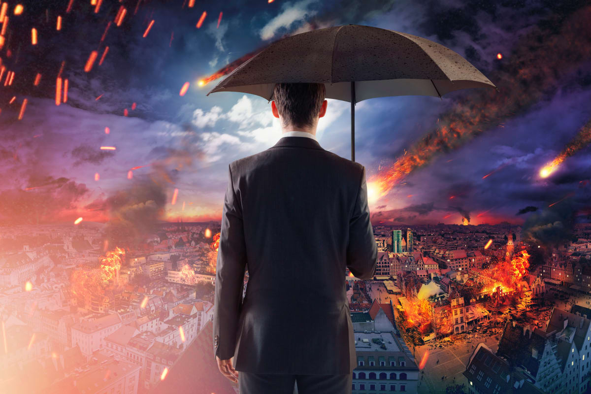 businessman surveying disaster