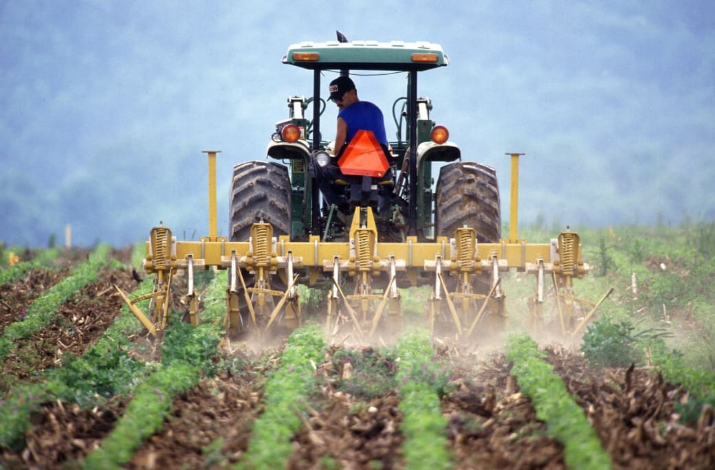 farmer plowing a field