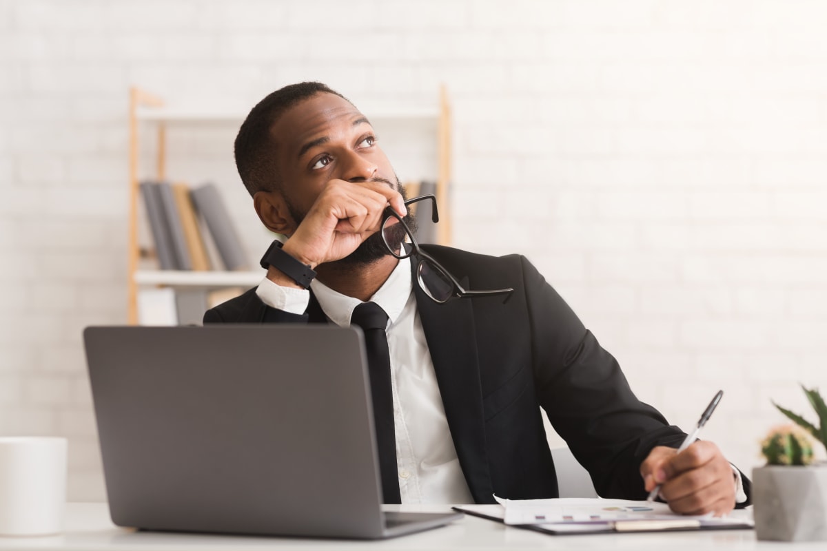 man holding glasses Starting a Business