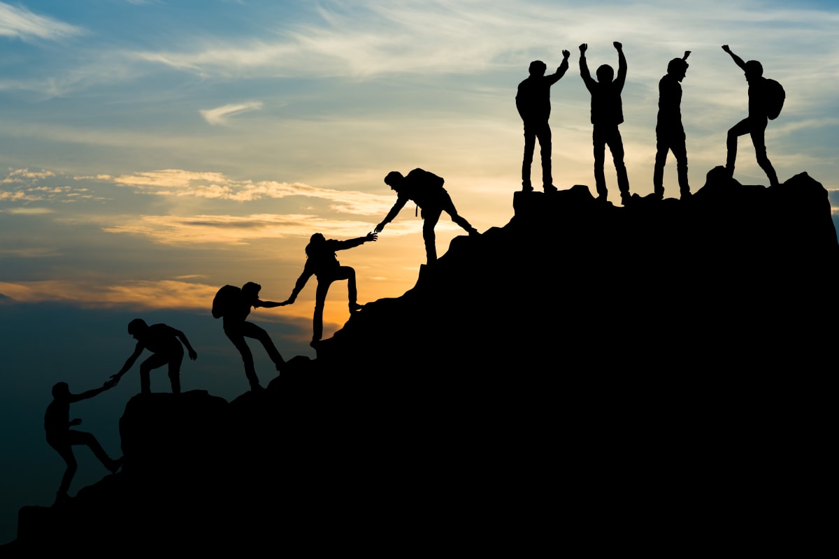 people climbing mountain